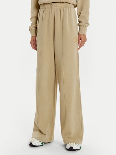 Lacoste Spodnie dresowe XF2657 Beżowy Wide Leg. Brązowe spodnie dresowe Lacoste, bez wzorów, z bawełny. Za 419,99 zł.