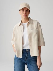 OPUS Bluzka w kolorze beżowym rozmiar: 38. Brązowe bluzki Opus, bez wzorów, bez kołnierzyka, bez ramiączek. Za 121,99 zł.