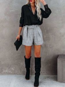 Milan Kiss Bluzka w kolorze czarnym rozmiar: L. Czarne bluzki Milan Kiss, l, bez wzorów, bez kołnierzyka, bez ramiączek. Za 152,99 zł.