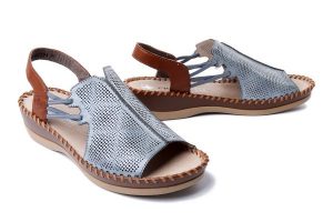 RIEKER 61359-14 blue, sandały damskie. Niebieskie sandały Rieker, w ażurowe wzory, bez obcasa, bez zapięcia. Za 247,92 zł.