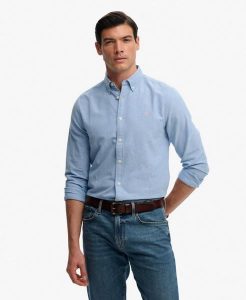 Superdry Preppy Oxford koszula z długim rękawem z organicznej bawełny. Niebieskie koszule Superdry, s, bez wzorów, z bawełny, bez kołnierzyka, bez ramiączek. Za 301,95 zł.