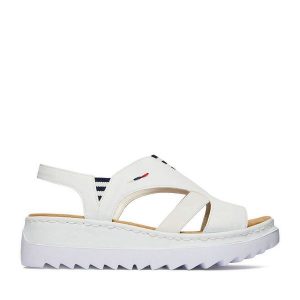 Sandały Rieker. Białe sandały Rieker, bez wzorów, bez obcasa, na koturnie, bez zapięcia. Za 319,99 zł.