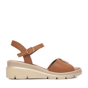Sandały Lasocki. Brązowe sandały Lasocki, bez wzorów, bez obcasa, na koturnie, bez zapięcia. Za 179,99 zł.