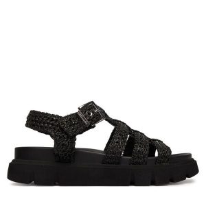 Sandały Tamaris. Czarne sandały Tamaris, bez wzorów, bez obcasa, na płaskiej podeszwie, bez zapięcia. Za 329,99 zł.