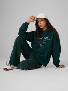 4F Bluza dresowa loose z kapturem damska - zielona XL. Zielone bluzy 4f, l, bez wzorów, z dresówki, z kapturem. Za 169,99 zł.