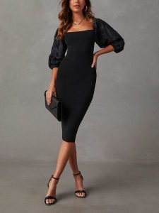 Milan Kiss Sukienka w kolorze czarnym rozmiar: XL. Czarne sukienki Milan Kiss, xl, bez wzorów, bez kołnierzyka, bez ramiączek, midi. Za 165,99 zł.