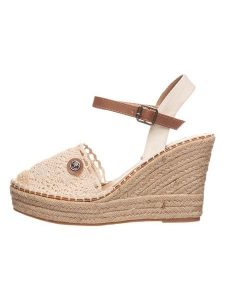 Tom Tailor Sandały w kolorze beżowym na koturnie rozmiar: 39. Brązowe sandały Tom Tailor, bez wzorów, bez obcasa, na koturnie, bez zapięcia. Za 91,56 zł.