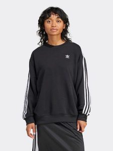 Adidas Bluza w kolorze czarnym rozmiar: M. Czarne bluzy ADIDAS, m, bez wzorów, z bawełny, bez kaptura. Za 180,06 zł.