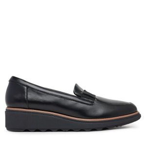 Półbuty Clarks. Czarne półbuty Clarks, bez wzorów, bez obcasa, na koturnie, bez zapięcia. Za 279,99 zł.