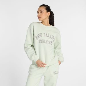 Bluza damska New Balance WT43516NUM – miętowa. Zielone bluzy New Balance, xl, bez wzorów, z bawełny, bez kaptura. Za 129,99 zł.