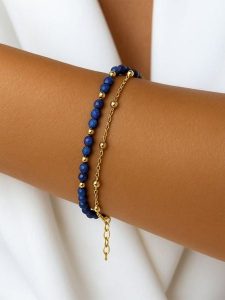 Taboo Pozłacana bransoletka z lapis lazuli rozmiar: onesize. Niebieskie bransoletki Taboo, z lazurytem, pozłacane. Za 118,56 zł.