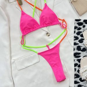 Strój kąpielowy stringi elastyczny materiał plaża aktywności wodne Benedetta. Czerwone stringi Intica, bez wzorów, z materiału. Za 129,00 zł.