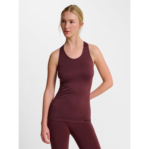 Damski bezszwowy tank top Hummel TIF. Brązowe topy Hummel, bez wzorów, z tkaniny, sportowe, bez kołnierzyka, bez ramiączek. Za 163,50 zł.