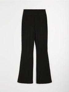 Sportowe legginsy flare Active - czarny. Czarne legginsy Sinsay, bez wzorów. Za 49,99 zł.
