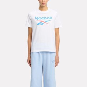 Koszulka damska Reebok Gym & Pilates. Bluzki Reebok, l, bez wzorów, z bawełny, klasyczne, bez kołnierzyka, bez ramiączek. W wyprzedaży za 89,99 zł.