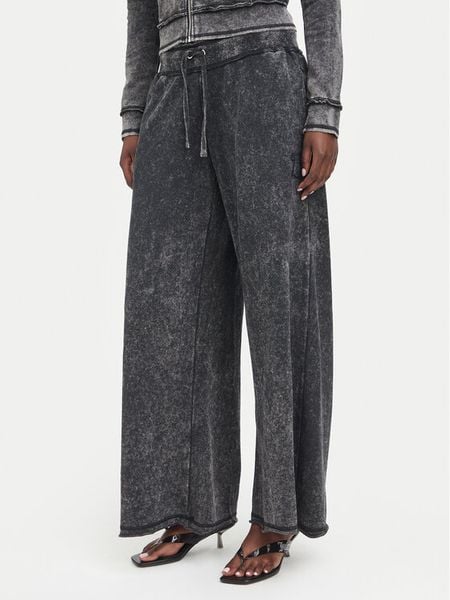 Juicy Couture Spodnie dresowe JCWBJ226321 Czarny Relaxed Fit. Czarne spodnie dresowe Juicy Couture, xxl, bez wzorów, z dresówki. Za 349,99 zł.
