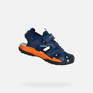 Sandały Geox Model J Borealis B Kolor Niebieski. Brązowe sandały Geox, bez wzorów, z syntetyku, bez obcasa, bez zapięcia. Za 245,99 zł.