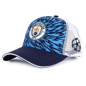 Czapka Manchester City - trucker - licencjonowana Champions League. Niebieskie czapki MANCHESTER CITY, bez wzorów, z bawełny, klasyczne. Za 97,00 zł.