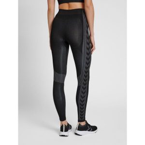 Damskie legginsy ze średnim stanem Hummel Shaping. Czarne legginsy Hummel, bez wzorów, z materiału. Za 128,00 zł.