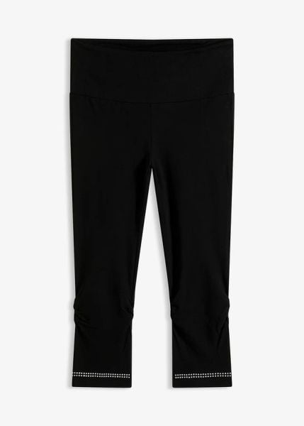 Legginsy rybaczki z połyskiem (2 szt.). Czarne legginsy bonprix, bez wzorów, z koronki. Za 55,98 zł.