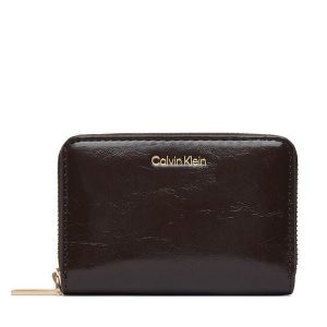 Portfel Calvin Klein. Brązowe portfele Calvin Klein, bez wzorów. Za 249,99 zł.