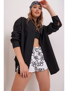 Trendyol Bluzka w kolorze czarnym rozmiar: L. Czarne bluzki Trendyol, l, bez wzorów, bez kołnierzyka, bez ramiączek. Za 60,99 zł.