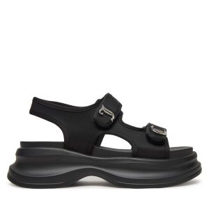 Sandały Juicy Couture. Czarne sandały Juicy Couture, bez wzorów, bez obcasa, na płaskiej podeszwie, bez zapięcia. Za 249,99 zł.