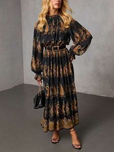 Milan Kiss Sukienka w kolorze czarno-jasnobrązowym ze wzorem rozmiar: XL. Brązowe sukienki Milan Kiss, xl, bez wzorów, bez kołnierzyka, bez ramiączek, maxi. Za 173,99 zł.