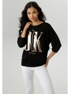 Aniston Koszulka w kolorze czarnym rozmiar: 42. Czarne bluzki Aniston, bez wzorów, bez kołnierzyka, bez ramiączek. Za 48,95 zł.