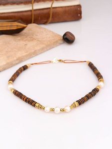 Charlize Pozłacany naszyjnik z tygrysim okiem i perłami - dł. 50 cm rozmiar: onesize. Białe naszyjniki Charlize, z perłą, pozłacane. Za 143,56 zł.