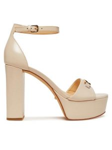 Guess Sandały FLJSET LEA03 Écru. Sandały Guess, z aplikacjami, ze skóry, bez obcasa, na słupku, bez zapięcia. Za 529,99 zł.