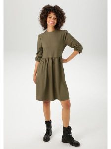 Aniston Sukienka w kolorze oliwkowym rozmiar: 36. Zielone sukienki Aniston, bez wzorów, bez kołnierzyka, bez ramiączek, mini. Za 88,23 zł.