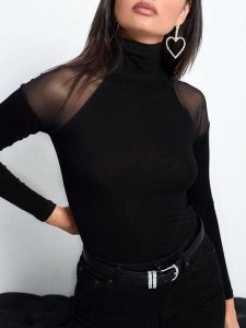 Milan Kiss Koszulka w kolorze czarnym rozmiar: S. Czarne bluzki Milan Kiss, s, bez wzorów, bez kołnierzyka, bez ramiączek. Za 130,81 zł.