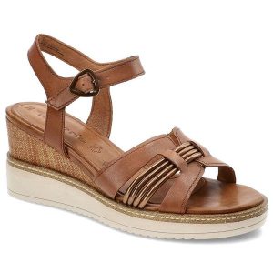 Brązowe Sandały Tamaris Damskie Modne Buty Letnie. Brązowe sandały Tamaris, z aplikacjami, z materiału, bez obcasa, na koturnie, bez zapięcia. Za 309,00 zł.