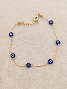 Luja Bijoux Pozłacana bransoletka z elementami ozdobnymi rozmiar: onesize. Niebieskie bransoletki Luja Bijoux, pozłacane. Za 61,45 zł.