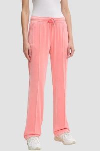 JUICY COUTURE Brzoskwiniowe damskie spodnie z cyrkoniami Tina, Rozmiar XS. Czerwone spodnie dresowe Juicy Couture, s, bez wzorów, z dresówki. W wyprzedaży za 331,99 zł.