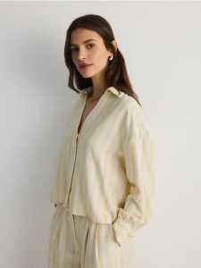 Koszula z wiskozą - jasnożółty. Żółte koszule Reserved, l, bez wzorów, z bawełny, bez kołnierzyka, bez ramiączek. W wyprzedaży za 39,99 zł.