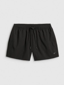 4F Spodenki plażowe z filtrem UPF50+ damskie - czarne XS. Czarne spodenki sportowe 4f, bez wzorów, z dzianiny, sportowe. Za 99,99 zł.