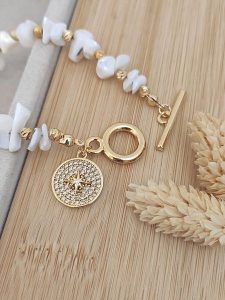 Nakkash Pozłacana bransoletka z kamieniami szlachetnymi rozmiar: onesize. Białe bransoletki Nakkash, z cyrkonią, pozłacane. Za 100,99 zł.