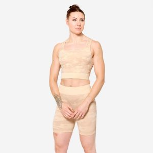 Koszulka fitness damska Domyos crop top. Brązowe bluzki DOMYOS, m, bez wzorów, z elastanu, sportowe, bez kołnierzyka, bez ramiączek. W wyprzedaży za 69,99 zł.