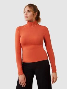 Les Lunes Koszulka "Steve" w kolorze pomarańczowym rozmiar: S. Pomarańczowe bluzki Les Lunes, s, bez wzorów, bez kołnierzyka, bez ramiączek. Za 152,99 zł.