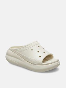 Crocs Klapki "Crush" w kolorze kremowym rozmiar: 37/38. Brązowe klapki Crocs, bez wzorów, z otwartym noskiem, bez obcasa, na platformie. Za 136,45 zł.