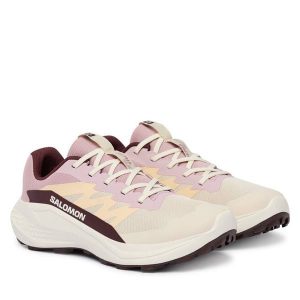 Buty do biegania Salomon. Białe buty sportowe Salomon, bez wzorów, bez zapięcia, do biegania. Za 429,99 zł.