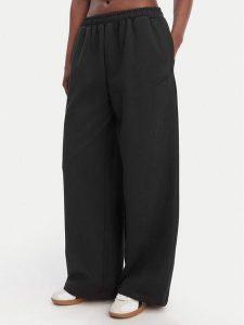 Reebok Spodnie dresowe Reebok x Ewa Chodakowska Hanna RK25624CCW Czarny Wide Leg. Czarne spodnie dresowe Reebok, xs, bez wzorów, z bawełny. Za 269,99 zł.