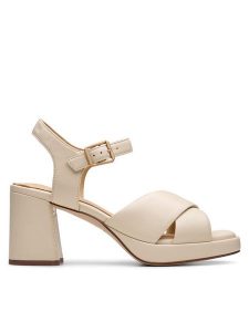 Clarks Sandały Ritzy75 Rae 26181304 Écru. Sandały Clarks, bez wzorów, ze skóry, bez obcasa, na słupku, bez zapięcia. Za 409,99 zł.
