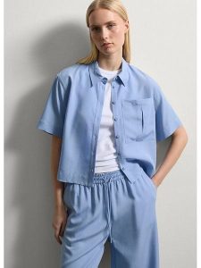 STEFANEL Koszula w kolorze błękitnym rozmiar: XL. Niebieskie koszule Stefanel, xl, bez wzorów, bez kołnierzyka, bez ramiączek. Za 165,99 zł.