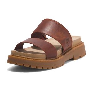 Klapki damskie Timberland Clairemont Way. Brązowe klapki Timberland, bez wzorów, bez obcasa. Za 359,99 zł.