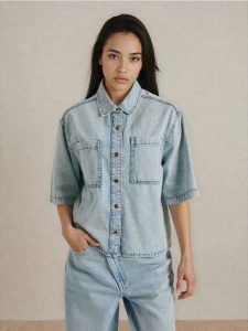 Jeansowa koszula z krótkim rękawem - niebieski. Niebieskie koszule Sinsay, l, bez wzorów, z jeansu, bez kołnierzyka, bez ramiączek. Za 59,99 zł.