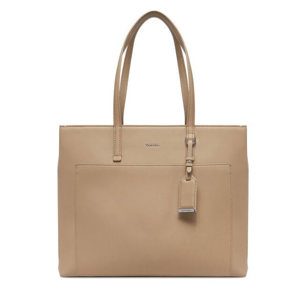 Torebka Calvin Klein. Brązowe shopper bag Calvin Klein, bez wzorów, bez dodatków. Za 439,99 zł.