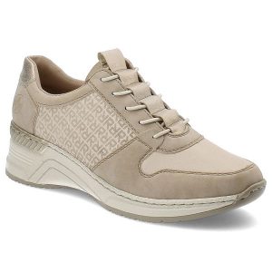 Beżowe Stylowe Sneakersy Rieker Modne Obuwie Damskie. Brązowe czółenka Rieker, bez wzorów, z jeansu, bez obcasa, na koturnie, bez zapięcia. Za 349,00 zł.